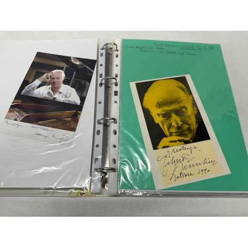 20 - A folder of coloured and black and white photographs bearing signatures comprising:- Sir George Mart... 