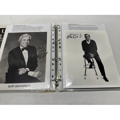 20 - A folder of coloured and black and white photographs bearing signatures comprising:- Sir George Mart... 