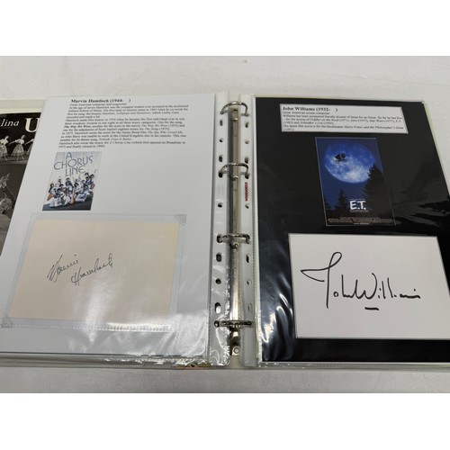 20 - A folder of coloured and black and white photographs bearing signatures comprising:- Sir George Mart... 