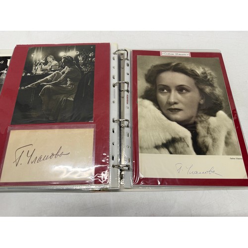 20 - A folder of coloured and black and white photographs bearing signatures comprising:- Sir George Mart... 
