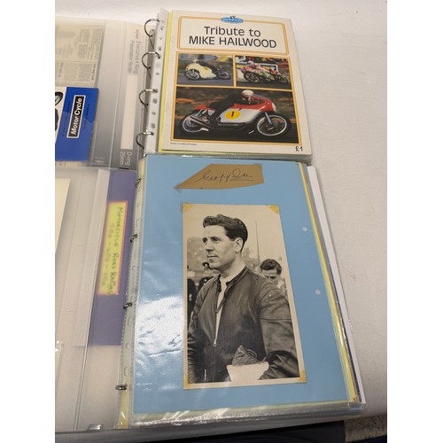 22 - A folder of coloured and black and white photographs bearing signatures comprising:- Geoff Duke, Mik... 