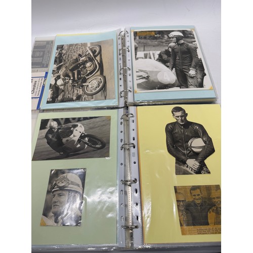 22 - A folder of coloured and black and white photographs bearing signatures comprising:- Geoff Duke, Mik... 