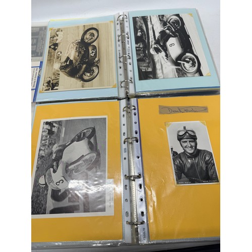 22 - A folder of coloured and black and white photographs bearing signatures comprising:- Geoff Duke, Mik... 