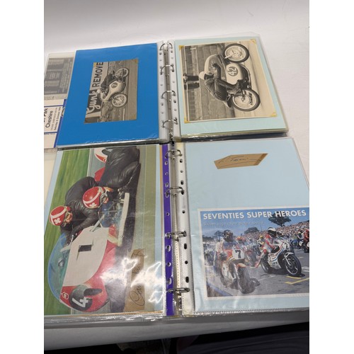 22 - A folder of coloured and black and white photographs bearing signatures comprising:- Geoff Duke, Mik... 