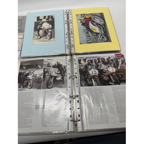 22 - A folder of coloured and black and white photographs bearing signatures comprising:- Geoff Duke, Mik... 