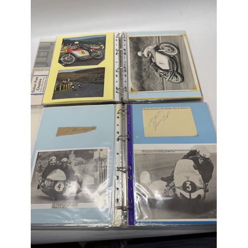 22 - A folder of coloured and black and white photographs bearing signatures comprising:- Geoff Duke, Mik... 