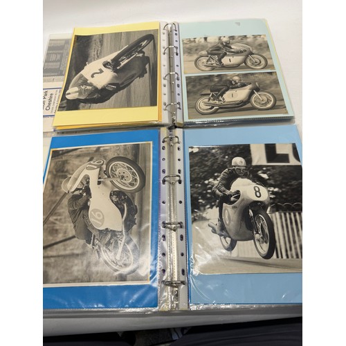22 - A folder of coloured and black and white photographs bearing signatures comprising:- Geoff Duke, Mik... 