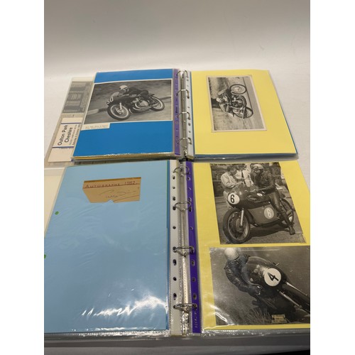 22 - A folder of coloured and black and white photographs bearing signatures comprising:- Geoff Duke, Mik... 