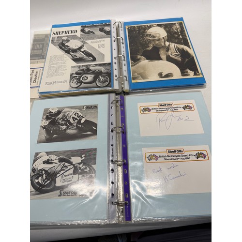22 - A folder of coloured and black and white photographs bearing signatures comprising:- Geoff Duke, Mik... 