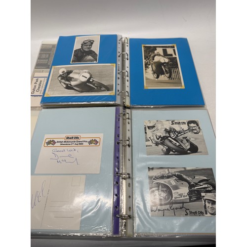 22 - A folder of coloured and black and white photographs bearing signatures comprising:- Geoff Duke, Mik... 