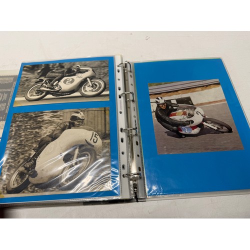 22 - A folder of coloured and black and white photographs bearing signatures comprising:- Geoff Duke, Mik... 