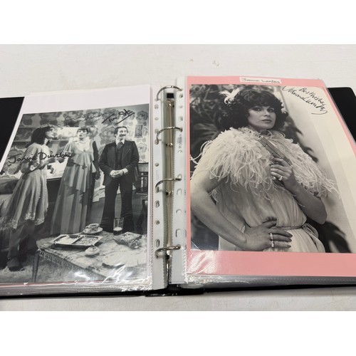 23 - A folder of coloured and black and white photographs bearing signatures comprising:- Aiden Turner, J... 