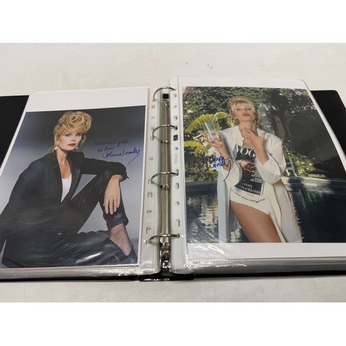 23 - A folder of coloured and black and white photographs bearing signatures comprising:- Aiden Turner, J... 