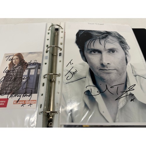 23 - A folder of coloured and black and white photographs bearing signatures comprising:- Aiden Turner, J... 