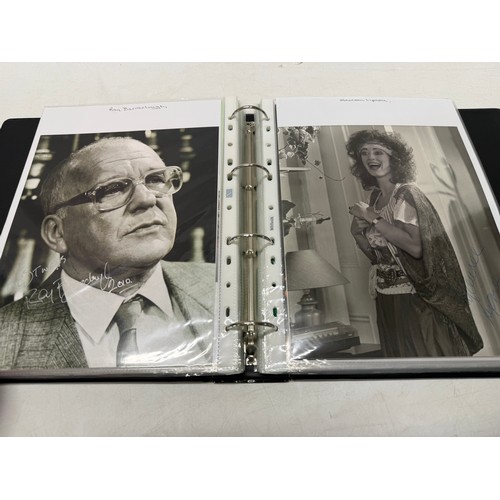 23 - A folder of coloured and black and white photographs bearing signatures comprising:- Aiden Turner, J... 