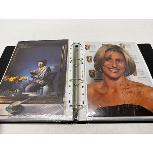 23 - A folder of coloured and black and white photographs bearing signatures comprising:- Aiden Turner, J... 