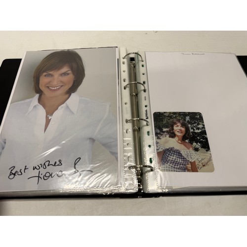 23 - A folder of coloured and black and white photographs bearing signatures comprising:- Aiden Turner, J... 