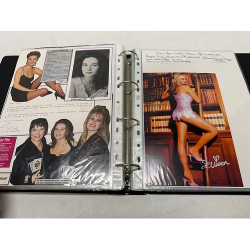 23 - A folder of coloured and black and white photographs bearing signatures comprising:- Aiden Turner, J... 