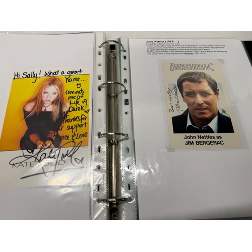 23 - A folder of coloured and black and white photographs bearing signatures comprising:- Aiden Turner, J... 