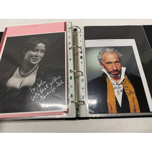23 - A folder of coloured and black and white photographs bearing signatures comprising:- Aiden Turner, J... 