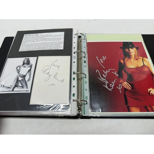 23 - A folder of coloured and black and white photographs bearing signatures comprising:- Aiden Turner, J... 
