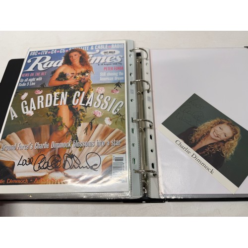 23 - A folder of coloured and black and white photographs bearing signatures comprising:- Aiden Turner, J... 