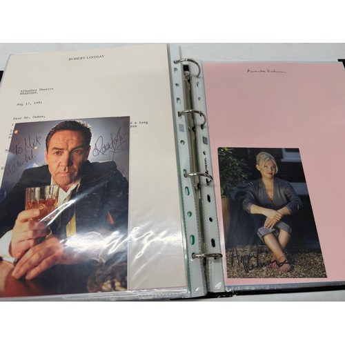23 - A folder of coloured and black and white photographs bearing signatures comprising:- Aiden Turner, J... 