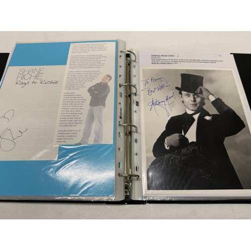 23 - A folder of coloured and black and white photographs bearing signatures comprising:- Aiden Turner, J... 