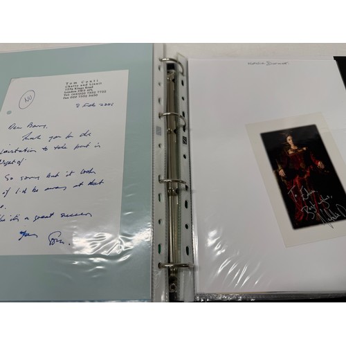 23 - A folder of coloured and black and white photographs bearing signatures comprising:- Aiden Turner, J... 