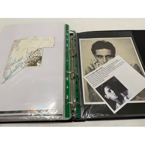 23 - A folder of coloured and black and white photographs bearing signatures comprising:- Aiden Turner, J... 