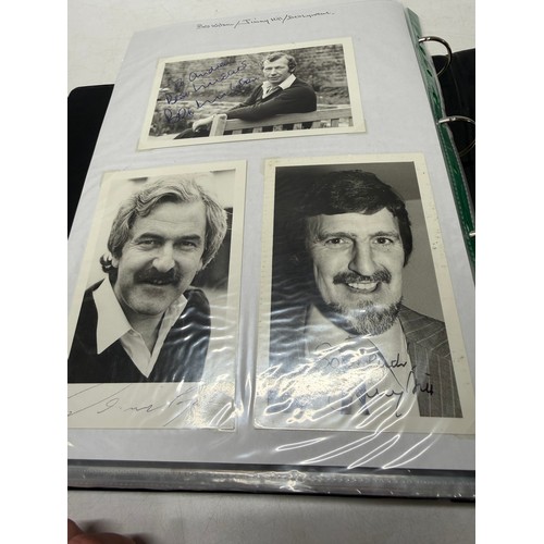 23 - A folder of coloured and black and white photographs bearing signatures comprising:- Aiden Turner, J... 
