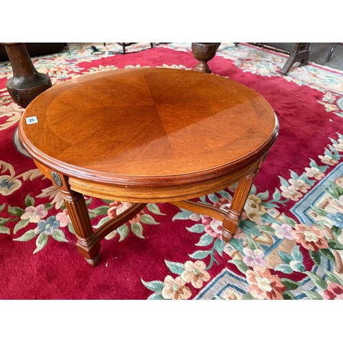 43 - A reproduction mahogany occasional table on fluted square legs united by 'X' shaped stretcher - 26in... 