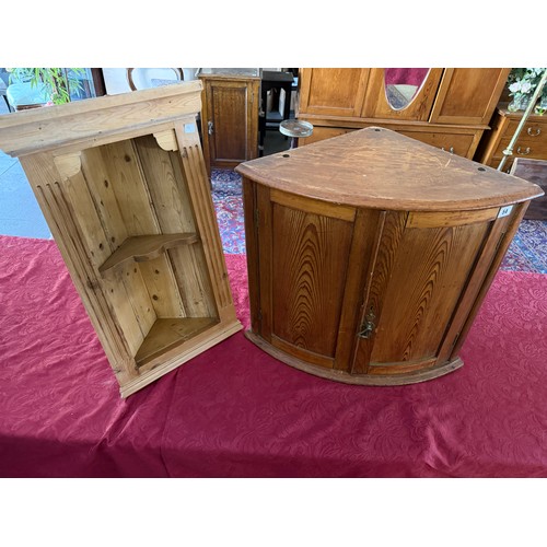 54 - A small Georgian pine wall hanging angle cabinet fitted two bow doors enclosing shelf, a small pine ... 