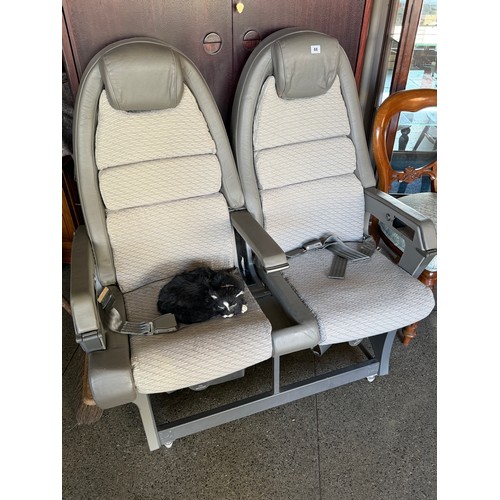 44 - A pair of Concorde grey leather and cloth aircraft seats complete with seat belts and drop down tray... 