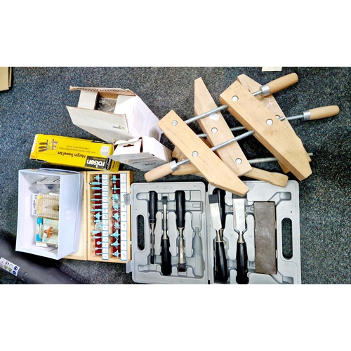 379 - Cased router bits, chisels, trowel set etc