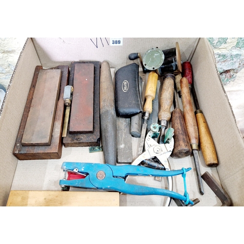 389 - Box of chisels, oil stones etc