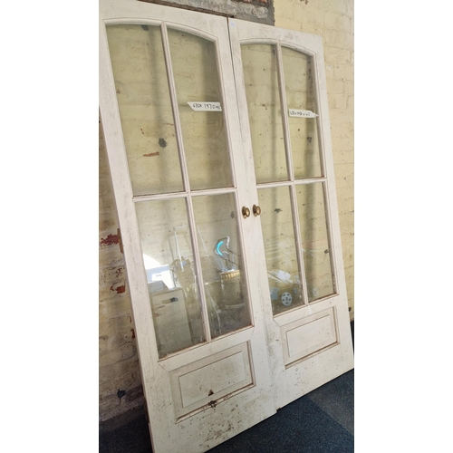 397 - Pair of glazed and a solid panel door