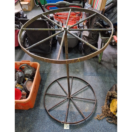 406 - Pair of metal fixed axle spoke wheels