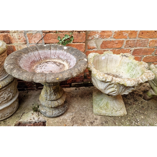 423 - Simulated stone acanthus leaf planter on plinth and a bird bath on column