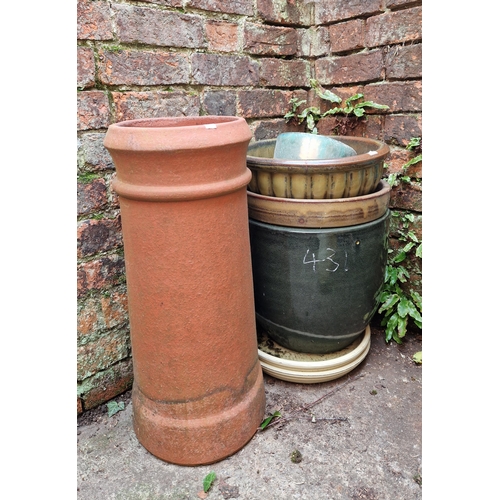 431 - Five assorted glazed planters, two stands and circular terracotta chimney pot