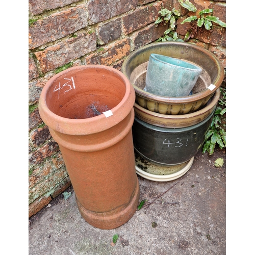 431 - Five assorted glazed planters, two stands and circular terracotta chimney pot