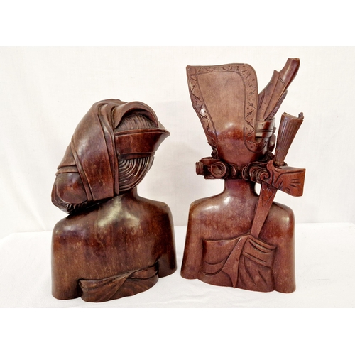 101 - Two Balinese hardwood carved female busts