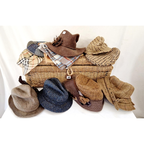 114 - Approx. 9 ladies and gents country hats and caps incl. Harris Tweed, Barbour etc and a raffia trunk