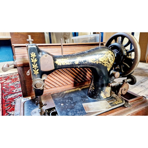 135 - Vintage cased Singer sewing machine