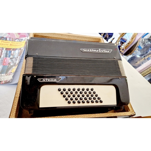 142 - Weltmeister Stella cased accordion