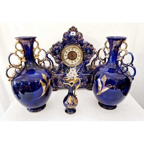 64 - Staffordshire ornate blue and gilt clock garniture and a Limoges blue and gilt urn form vase