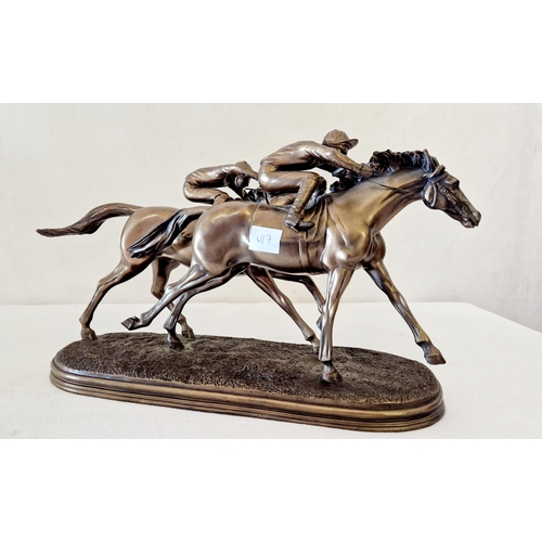 69 - Bronzed metal sculpture of two jockey's horse racing