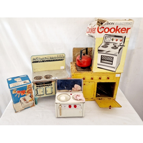 172 - Four vintage boxed and loose dolls tin plate toys incl. range cookers, washing machine etc