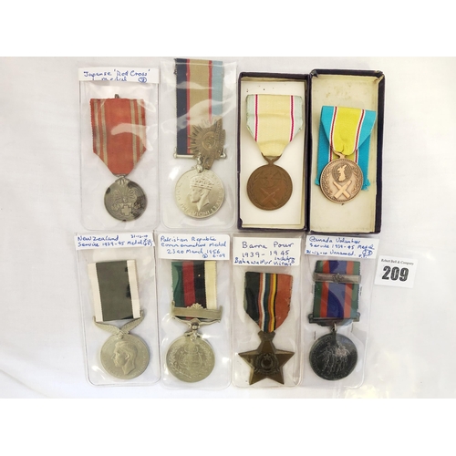 209 - Eight World and Commonwealth medals, comprising Japanese WWII Red Cross Silver medal; Indian WWII Ba... 