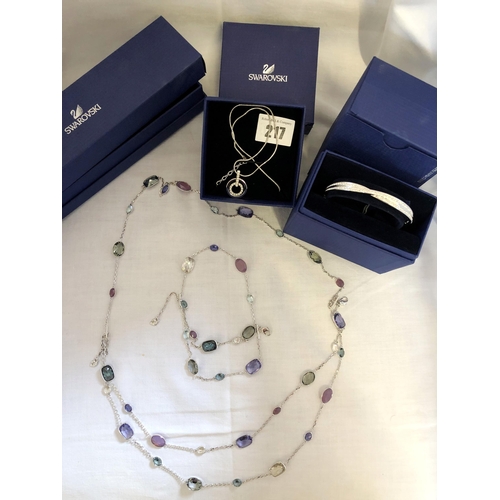 217 - Qty of boxed Swarovski jewellery comprising a bangle; inset pendant necklace; matching necklace and ... 